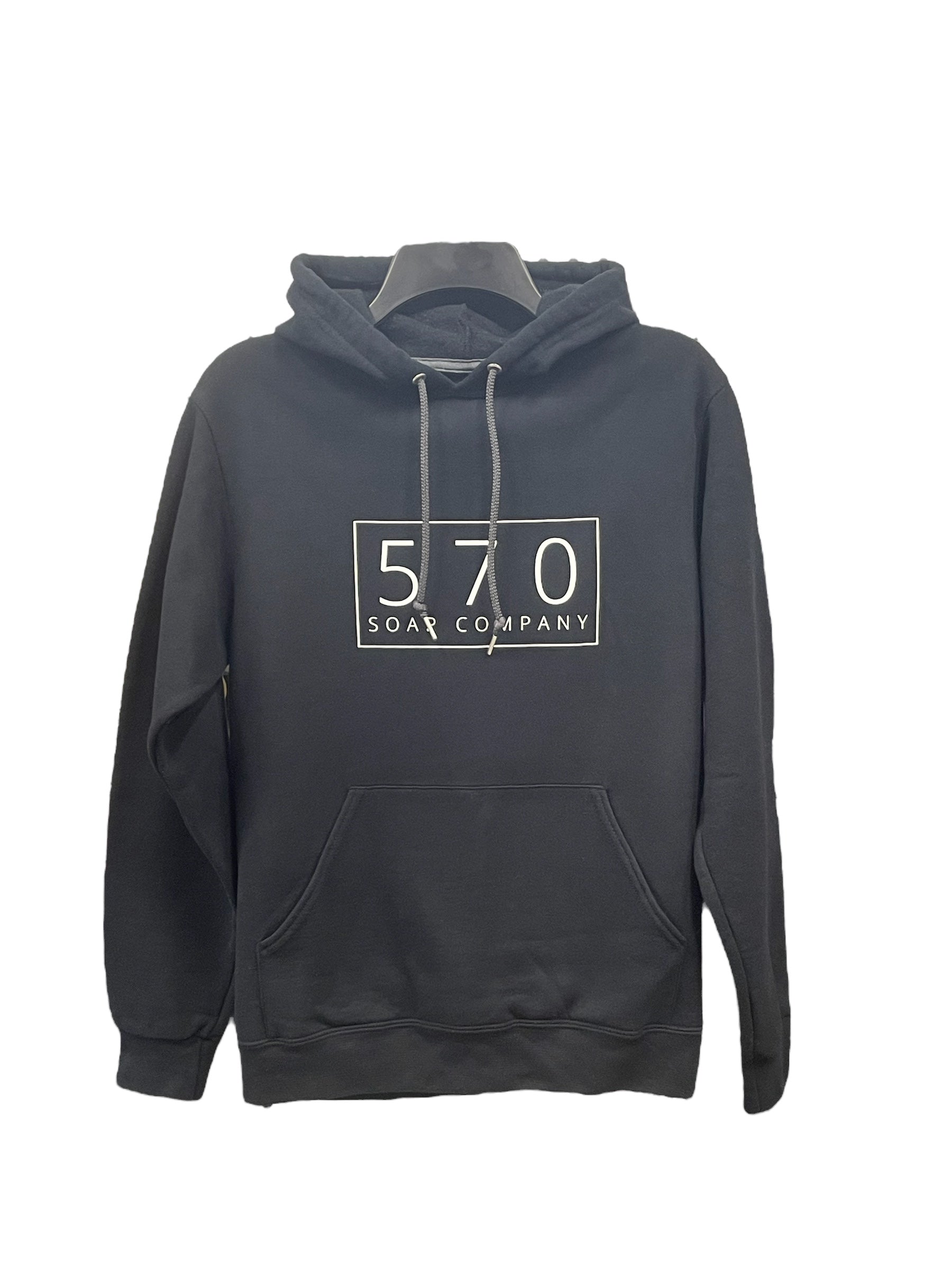 This black hoodie features a front pouch pocket and drawstrings at the neck. Displayed on the chest is a rectangular logo reading "570 Soap Co." in white, reflecting the premium quality of our handmade skincare products.