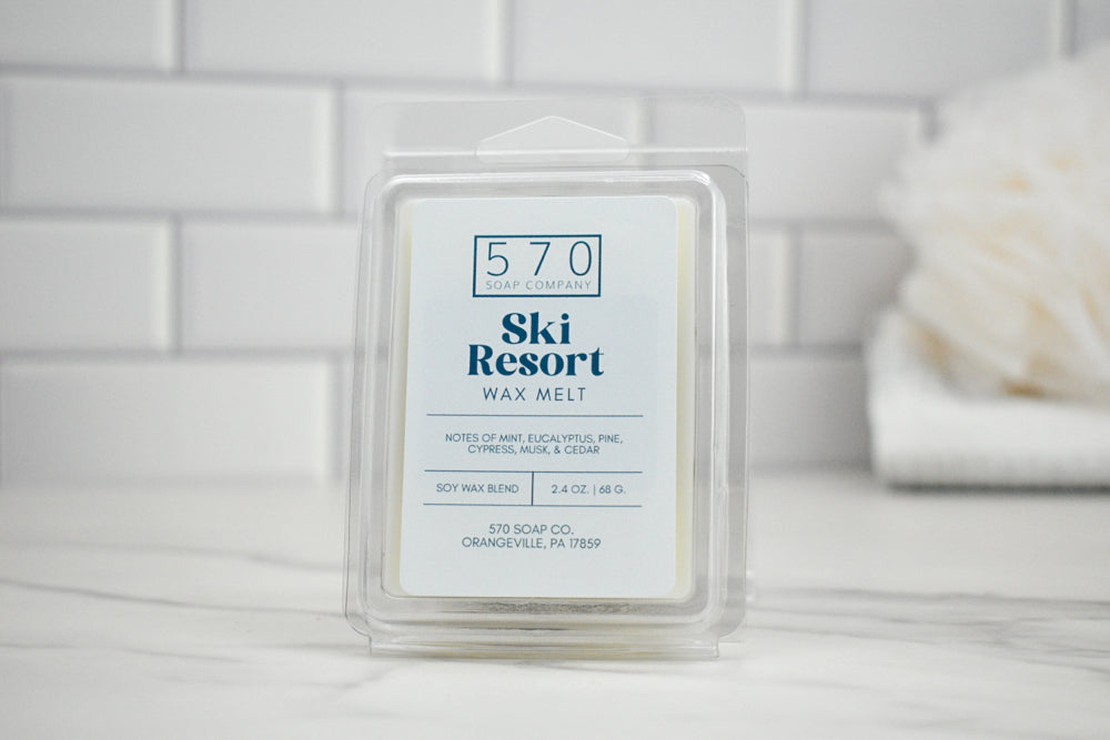 Ski Resort wax melt packaging with label on a white surface