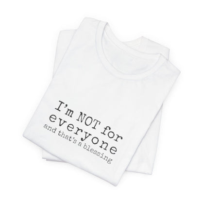 White tank top with text 'I'm NOT for everyone and that's a blessing' on a white background