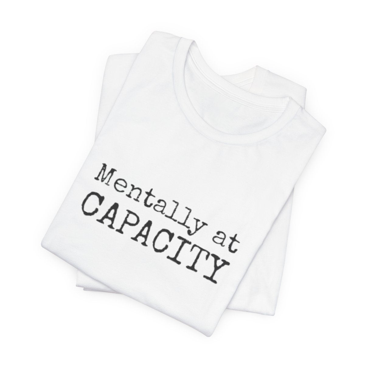 White tank top with 'Mentally at CAPACITY' text on a white background