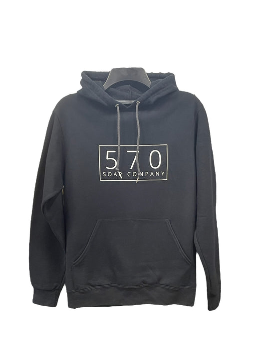 This black hoodie features a front pouch pocket and drawstrings at the neck. Displayed on the chest is a rectangular logo reading "570 Soap Co." in white, reflecting the premium quality of our handmade skincare products.