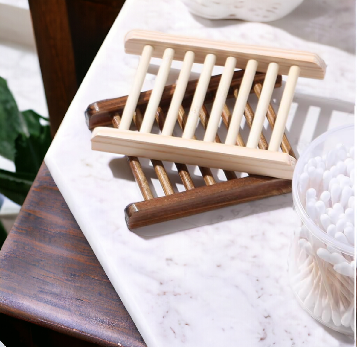 A stack of Bamboo Wooden Self Draining Soap Dish from 570 Soap Co. 