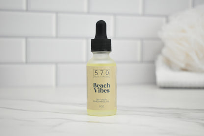 Bottle of '570 Beach Vibes' natural product on a white tiled background
