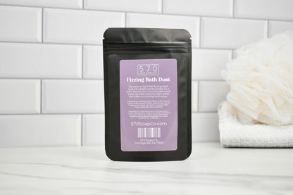 Packaged product labeled '570' on a white tiled bathroom wall.