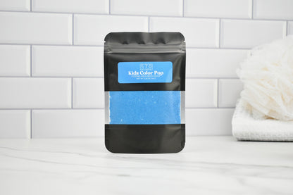 Black packaging with blue content on a white tiled background