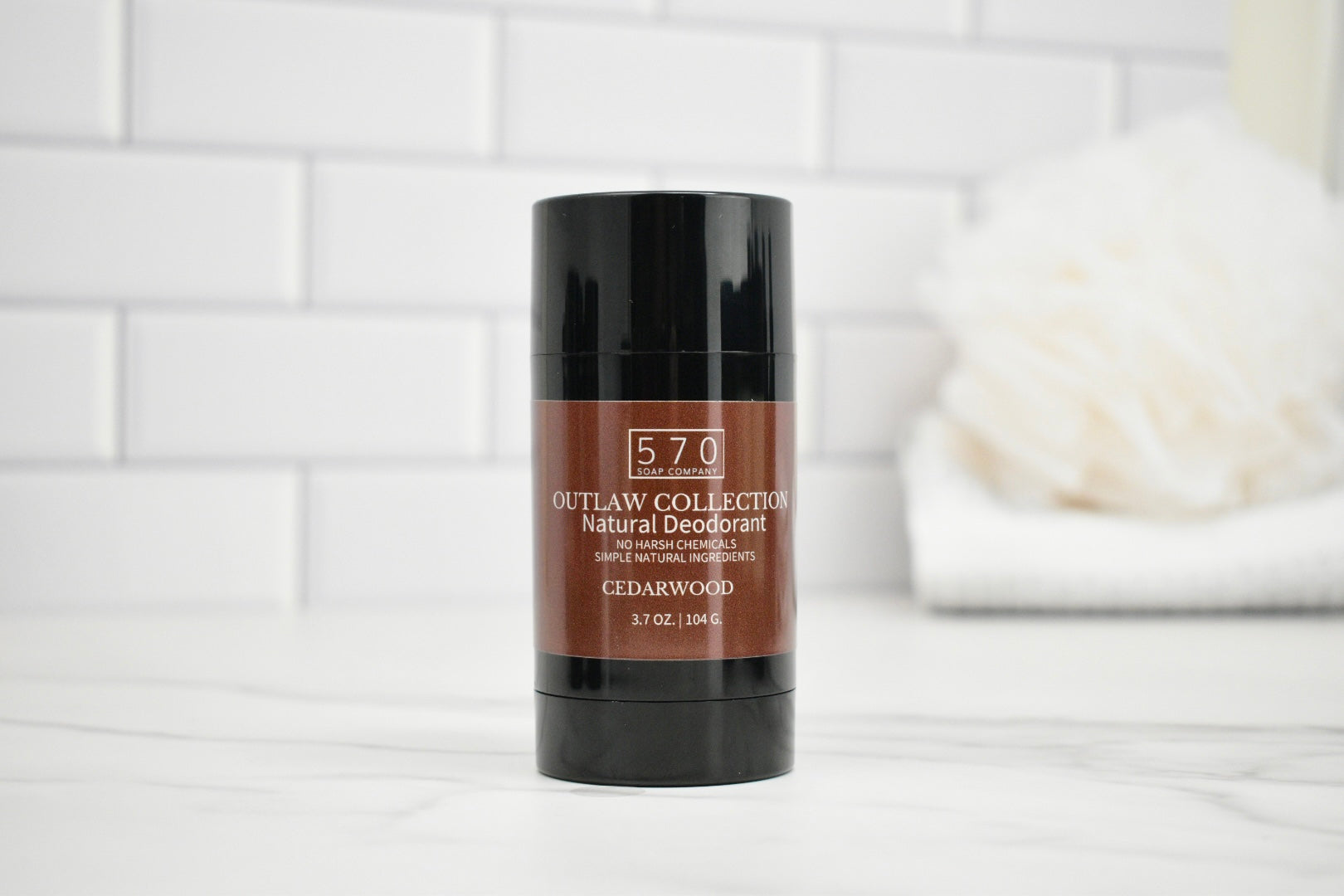 Deodorant stick with '570' branding on a white background