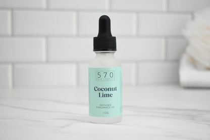 Bottle of 570 Coconut Lime fragrance oil with dropper on a white surface.