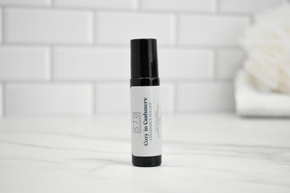 Skincare bottle with white label on a bathroom counter