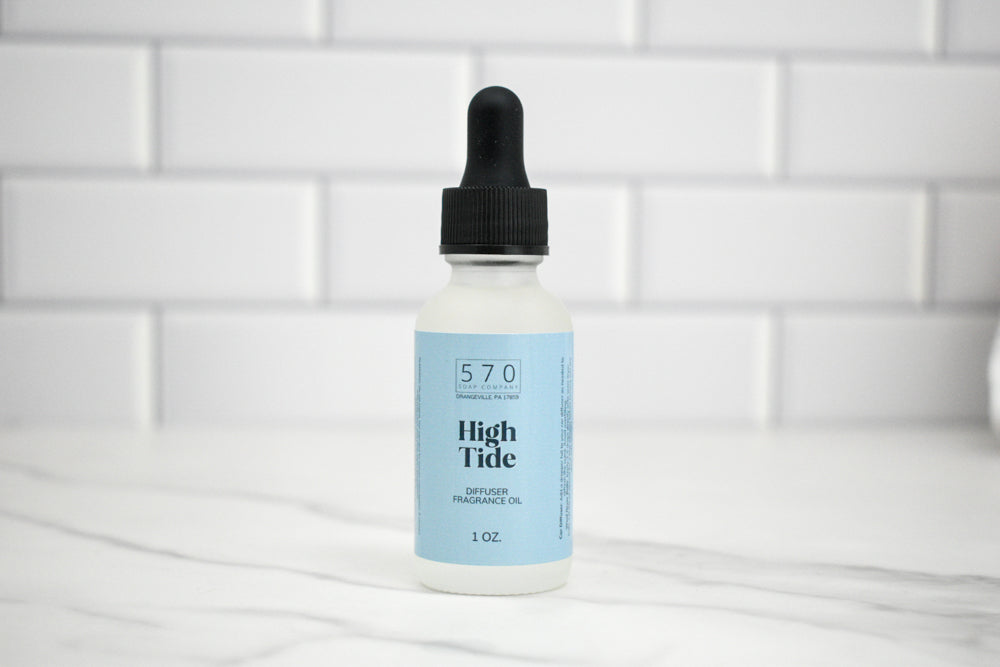 Bottle of High Tide fragrance oil with a dropper on a white background