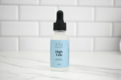 Bottle of High Tide fragrance oil with a dropper on a white background