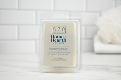 Home + Hearth wax melt packaging on a white background