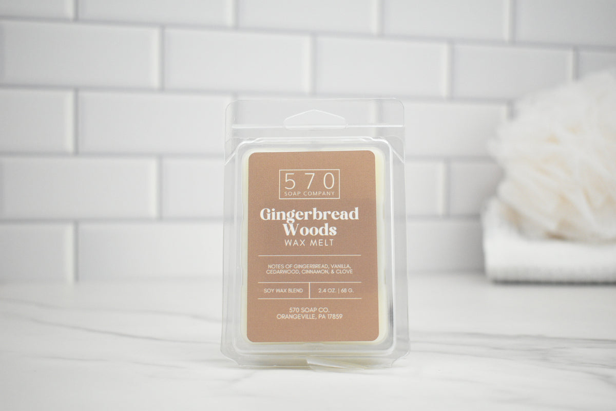 570 Soap and Candle Gingerbread Woods wax melt packaging on a white tiled background
