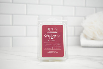 Cranberry Fire wax melt packaging on a white tiled background