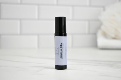 Skincare serum bottle with a white label on a light gray surface.