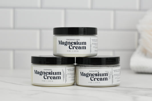 Three jars of Magnesium Cream, fragrance free, lavender essential oil, and eucalyptus essential oil