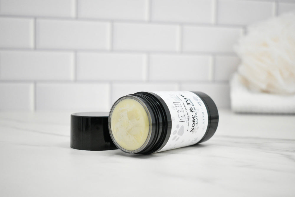Cosmetic jar with lid on a bathroom counter